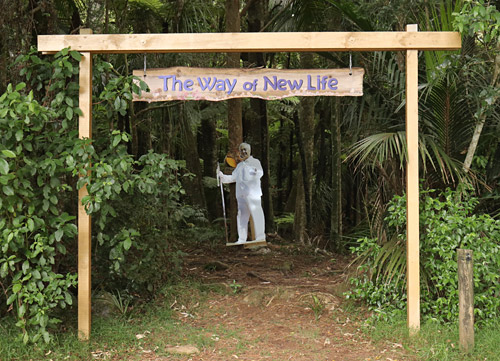 A cut-out of Ilchi Lee welcomes visitors to 'The Way of New Life'