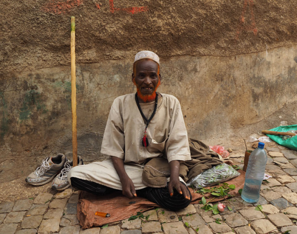 An elderly gentleman in Harar prepares to spend the afternoon chewing chat, a mildly narcotic leaf.