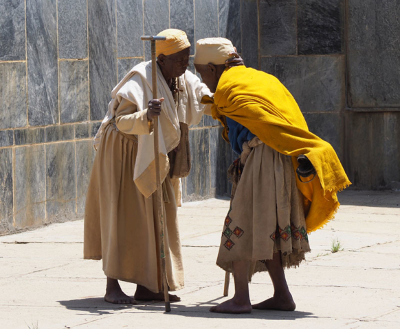 Pilgrims greet each other outside the new Cathedral of St Mary of Zion in Axum.