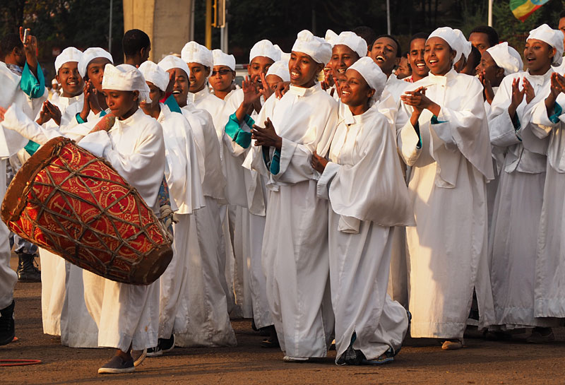White-robed women dance, clap and sing around Meskel Square.