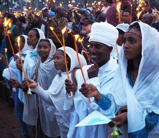 The viewing terraces around Meskel Square are transformed into a flickering sea of flames.