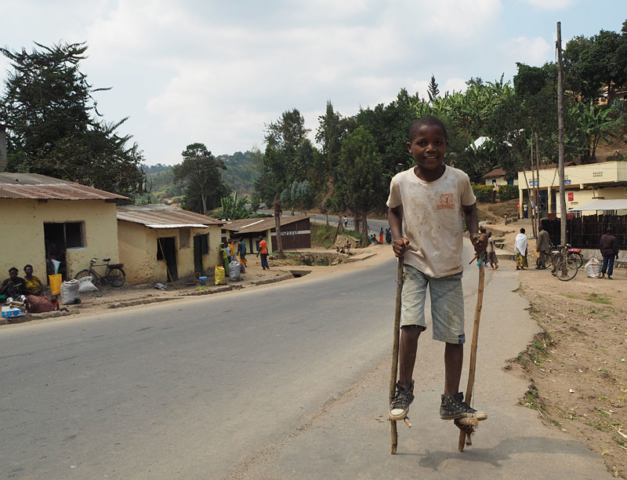 A boy on home-made stilts in a village near Gisenyi.