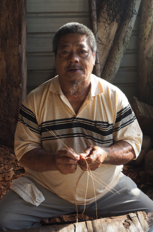Making coconut fibre rope at a cultural centre for the aged.