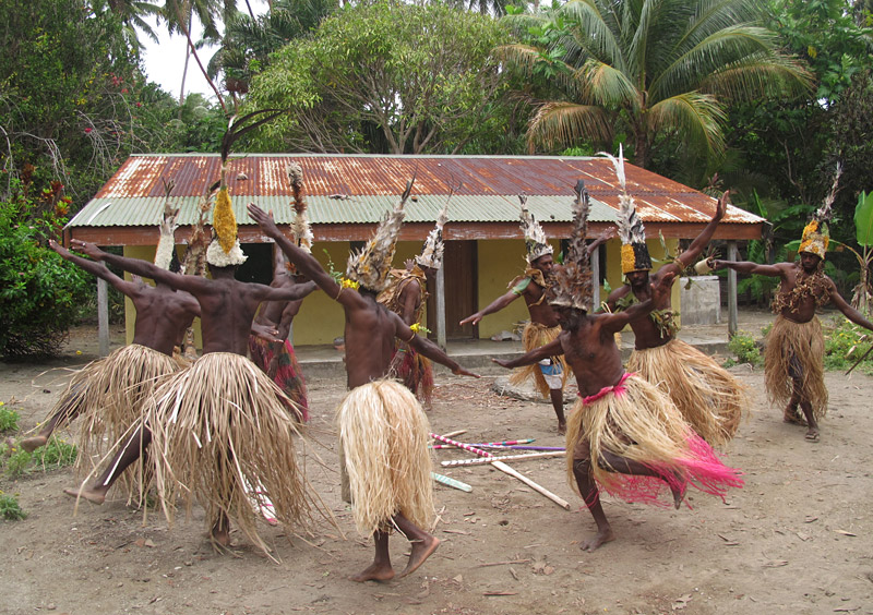 Villagers in the Maskelyne Islands perform a traditional dance based on the flight of a bird