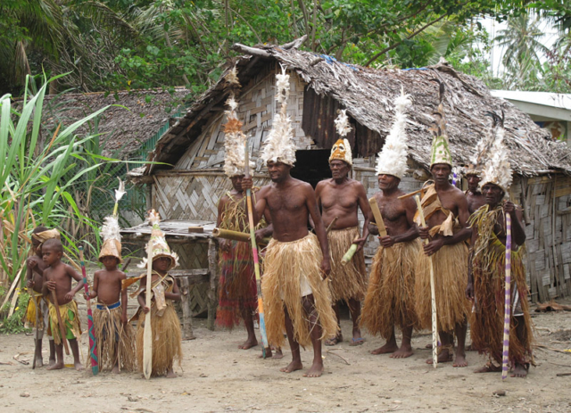 Young boys learn a traditional dance in the Maskelyne Islands