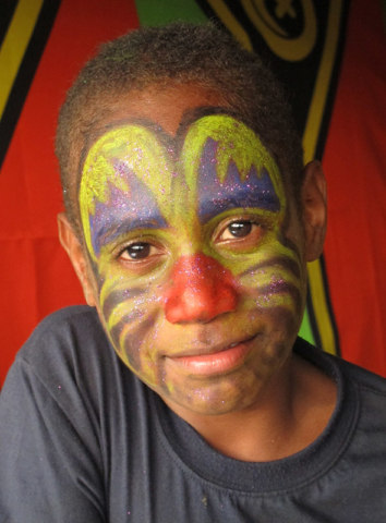 A Ni-Vanuatu boy shows off his facepaint during independence day celebrations in Port Vila