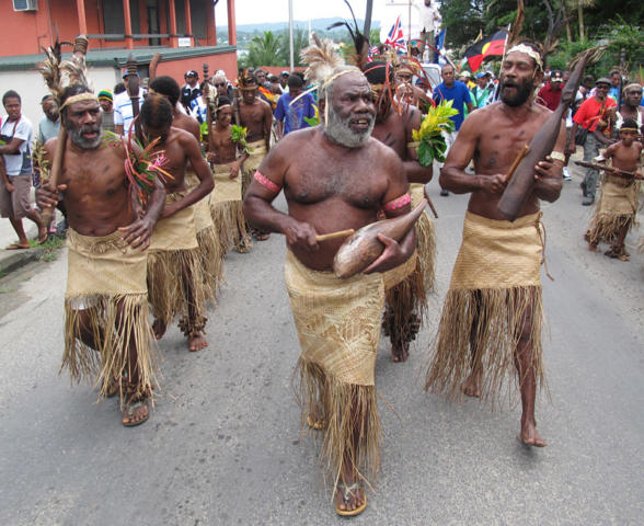 Men march through Port Vila to mark 150 years since the start of blackbirding, the kidnapping of islanders as labour for Australian plantations