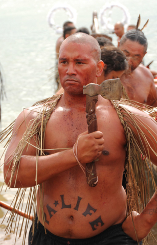 A warrior after the mass haka on Tii Beach