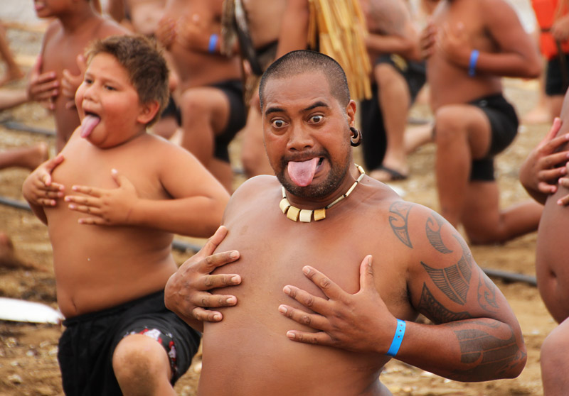 Oti Tarawa performs a haka on Tii Beach