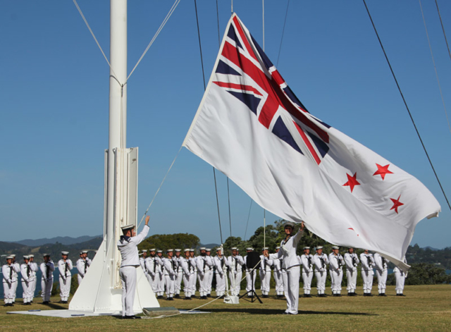 The Treaty Grounds flag is lowered as Waitangi Day draws to an end