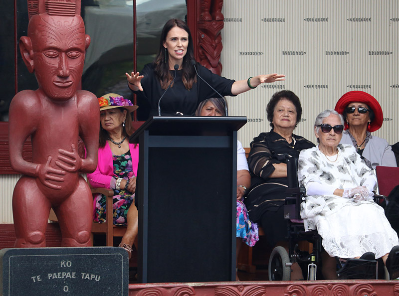 Prime Minister Jacinda Ardern speaks at Te Whare Rūnanga (the carved meeting house)
