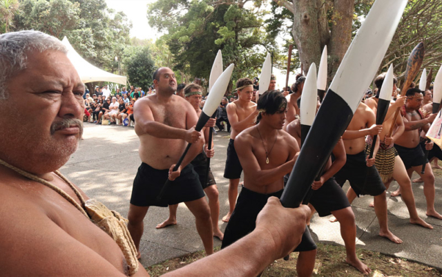 Kaihoe (paddlers) perform a haka powhiri to welcome Governor-General Dame Patsy Reddy