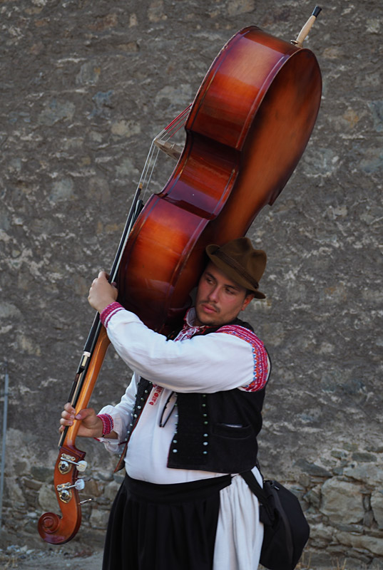 A Moravian double-bass player in traditional dress