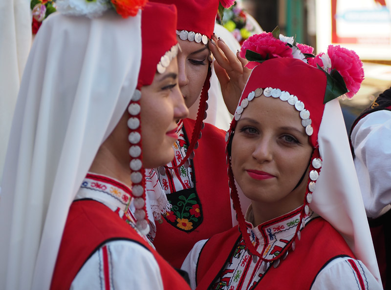 Singers from Bulgarian group Madara await their turn on stage