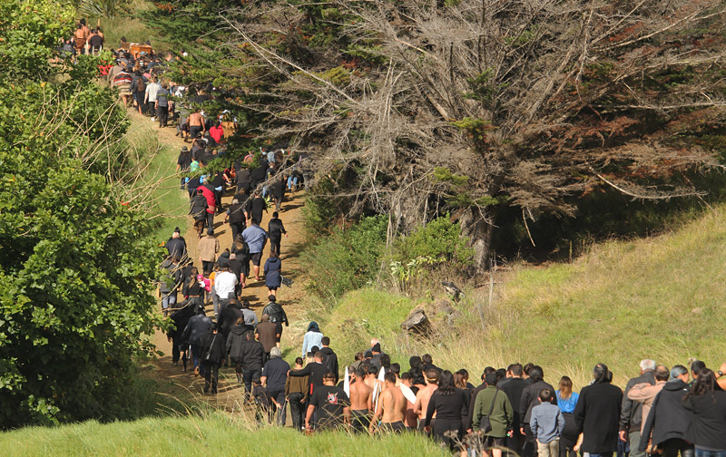 Mourners follow Sir Hek's casket to his final resting place at Te Rangihaukaha Urupa