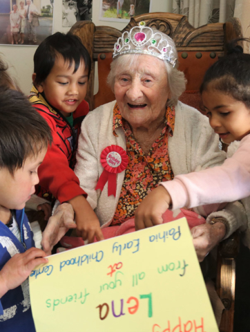 JUNE: Lena Walker, of Haruru Falls, celebrates her 107th birthday with little friends from a nearby childcare centre. Photo: Peter de Graaf