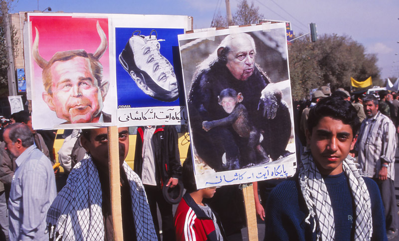 Protesters carry caricatures of US president George W Bush and Israeli Prime Minister Ariel Sharon
