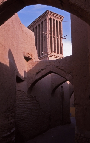 An alleyway and wind tower, an ancient form of air conditioning, in Yazd