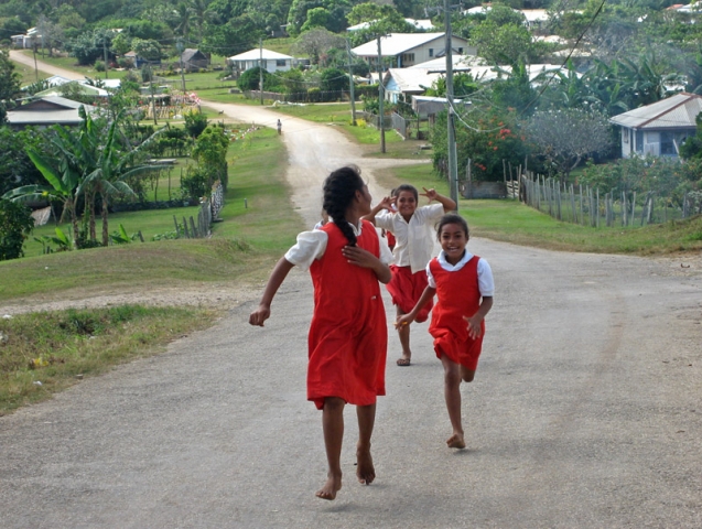 Schoolchildren spot a camera on Foa Island