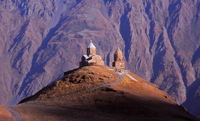 The 14th century Tsminda Sameba (Holy Trinity) Church perches on a 2170m-high peak in the Caucasus Mountains