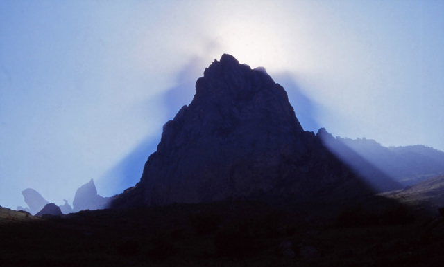 The sun plays tricks with the sacred Five-finger Mountain (Beşbarmaq Dağ)