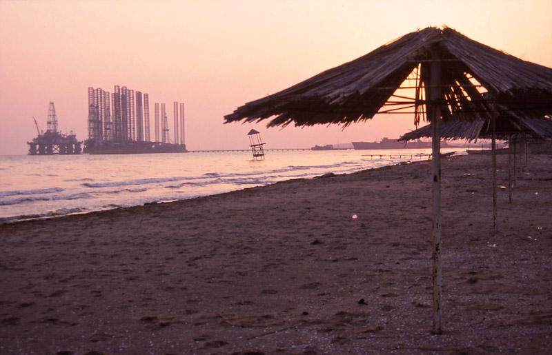 Oil rigs loom off Baku’s premier swimming spot, Şixov Beach