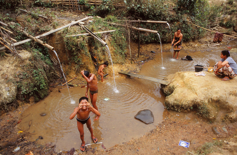 Shower time in Huay Boy village