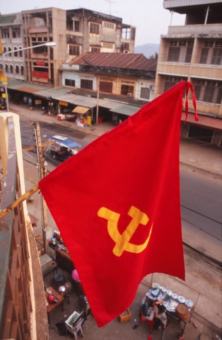 Communist flag outside my $2.50-a-night hotel room in Pakxe