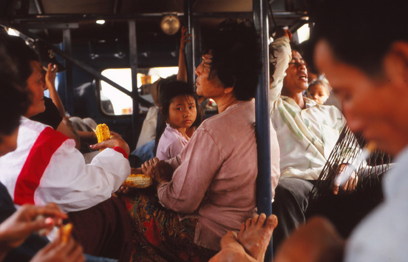 Scene inside a crowded bus in southern Laos