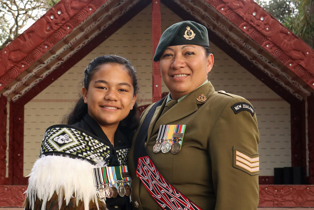 February: Manea Albert-Renata and her mum Leigh Albert, a sergeant in the NZ Army, at the opening of a new museum dedicated to the 28th Māori Battalion. Photo: Peter de Graaf