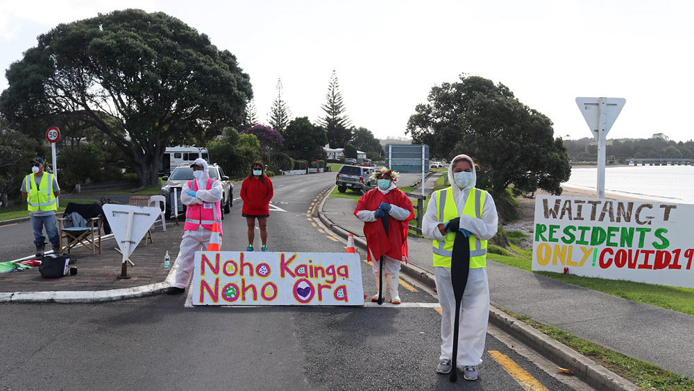 April: Volunteers of the self-declared Tai Tokerau Border Control guard a Covid-19 checkpoint at the entrance to Waitangi. Photo: Peter de Graaf