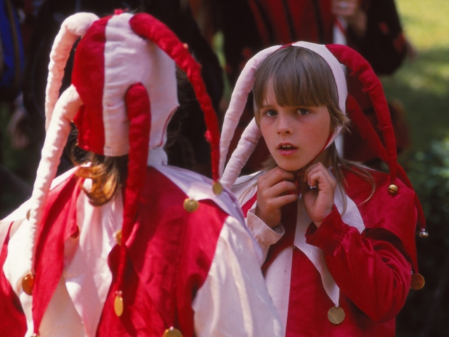 Children dress as jesters during the Festival of the Five-Petalled Rose, Český Krumlov