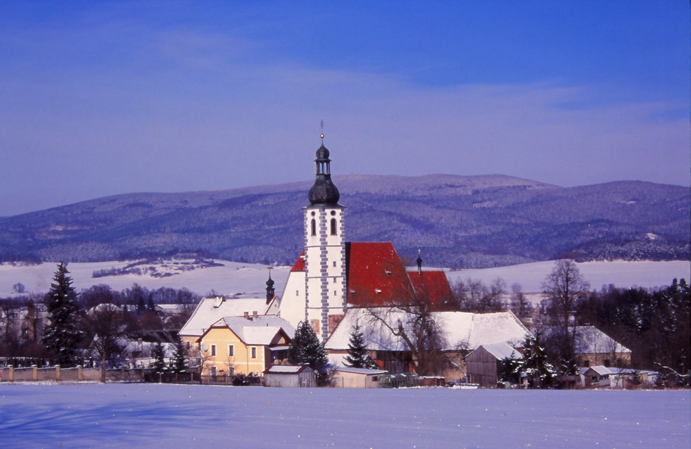 Village church in a wintry South Bohemia
