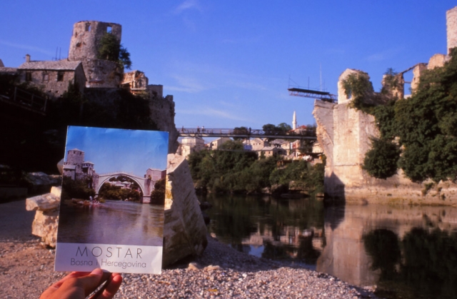 Bosnia, 1999: Ruins of the 16th century Stari Most (Old Bridge) and a tourist brochure showing how it used to look. It was rebuilt in 2004