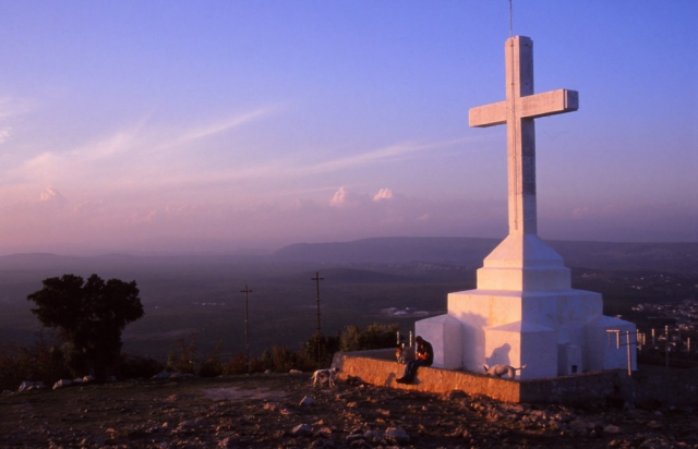 Bosnia, 1999: A cross atop Apparition Hill in Medjugorje, where pilgrims believe the Virgin Mary appeared in 1981