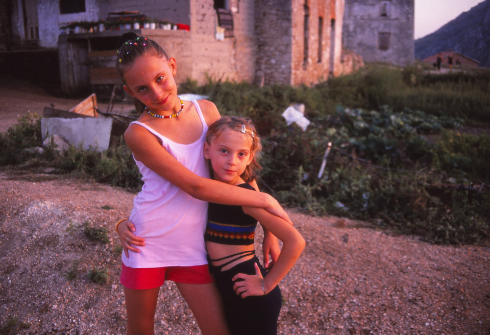Bosnia, 1999: Girls play in a war-damaged quarter of Mostar