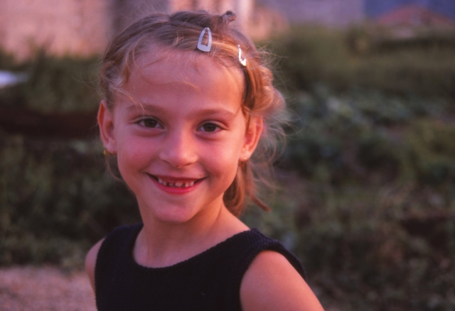 Bosnia, 1999: A Bosnian girl poses for the camera in Mostar