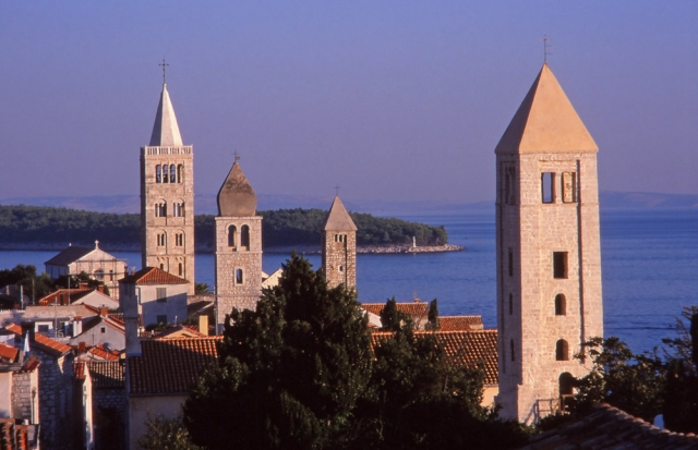 Croatia, 1999: Church towers in Rab, a historic town on the island of the same name