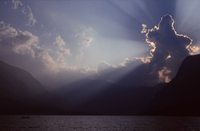 Slovenia, 1994: Sunburst over Lake Bohinj in the Julian Alps