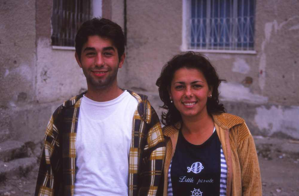 Albert Bojaxhui and his sister Genta outside their family's apartment in Berat