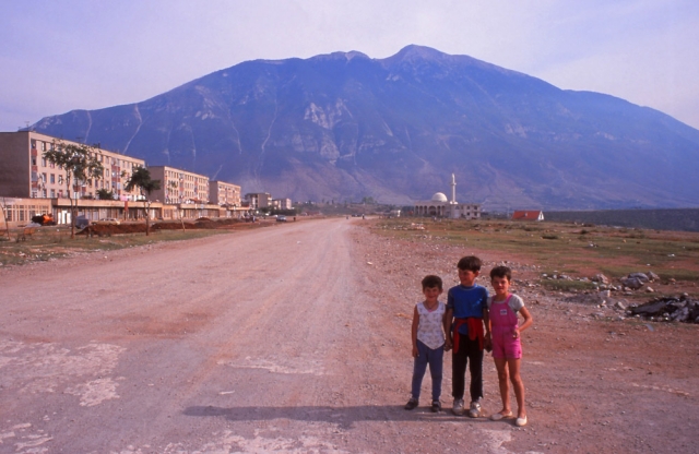 The main street of Kukës, near the Kosovo border, with 2500m-high Mt Gjallica in the distance