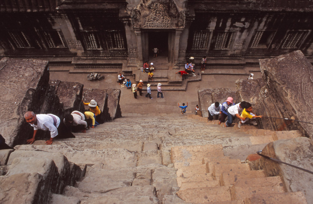 The vertiginously steep steps leading to the highest level of Angor Wat symbolise the difficulty of reaching heaven