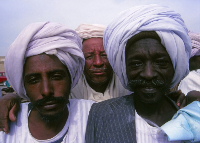 Sudanese traders at Cairo's camel market
