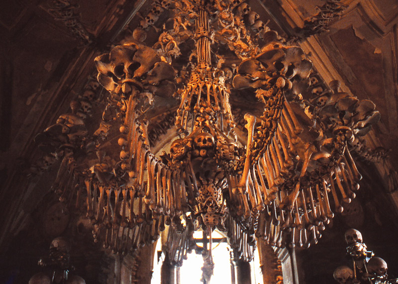 A massive chandelier is the ossuary's morbid masterpiece