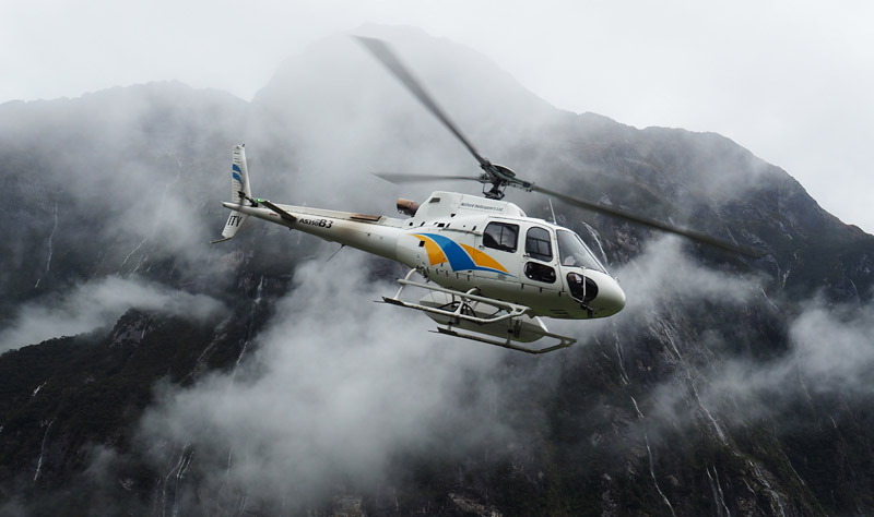 The journey ends with a helicopter flight through iconic Milford Sound