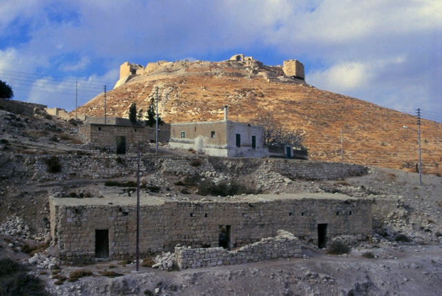 The ruins of a 12th century Crusader castle as seen from the village of Shobak