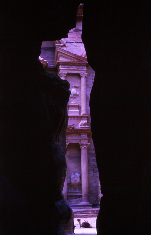 The famous first glimpse of Petra is the Treasury framed by a narrow canyon called the Siq