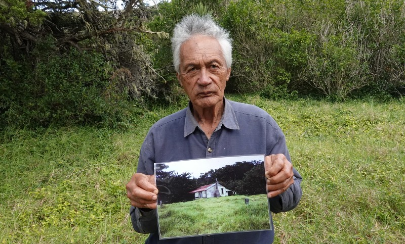 Kaumātua Matutaera Clendon at the site of the old family home, at Otupoho/Homestead Bay.